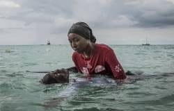 Swim instructor Siti, 24, helps a girl float on Thursday, November 17, 2016 in the Indian Ocean off of Nungwi, Zanzibar.
