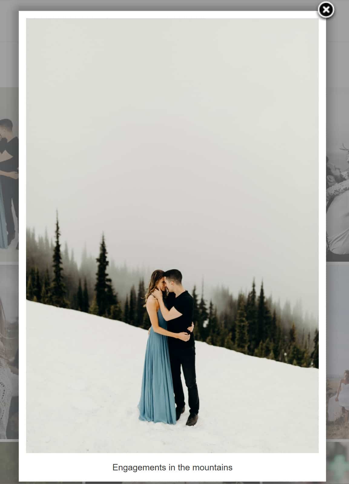 Screenshot of our Fancybox Lightbox Effect, a couple kissing in the snow