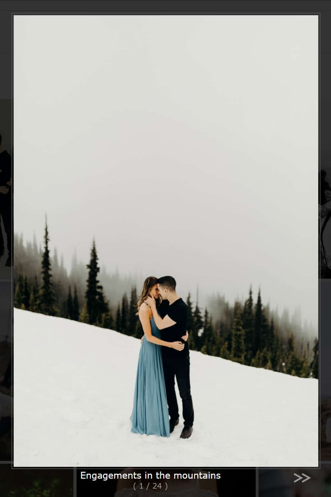 Screenshot of our Shutter Lightbox Effect, two people kising in the snow