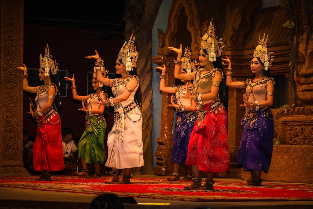 In 1967, the queen's granddaughter Princess Norodom Buppha Devi, daughter of  King Norodom Sihanouk, performed the Apsara ballet in public. Buppha Devi combined two legends to create her ballet. The first part was from ancient Hindu texts that described the churning of the primordial ocean when the gods and demons searched for the elixir of Immortality called "Amrit". In the process, the spirits of water and clouds were released as heavenly nymphs or Apsaras. The Apsaras ascended to heaven to become dancers in the court of the Gods. The second part of the ballet was based on the Cambodian love story of king Kambu and the Apsara queen Mera. The ballet caught public imagination both in Cambodia and abroad. Princess Buppha Devi, who had started training for ballet dancing at the tender age of five, was an accomplished ballerina by then. She led the royal Cambodian dance troupe in many performances all over the world.